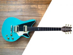 Seafoam Green Spada Deluxe, with a Aileron headstock and zebra pickups.